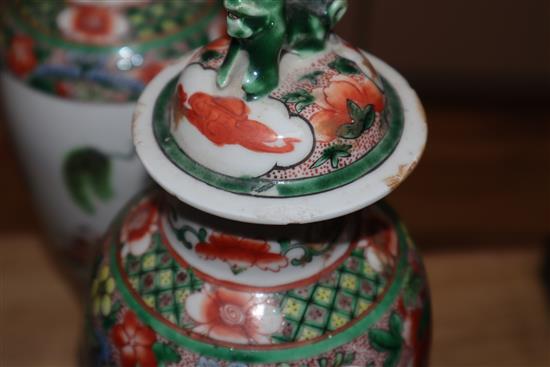 A pair of 20th century Chinese famille verte vases and covers height 35cm